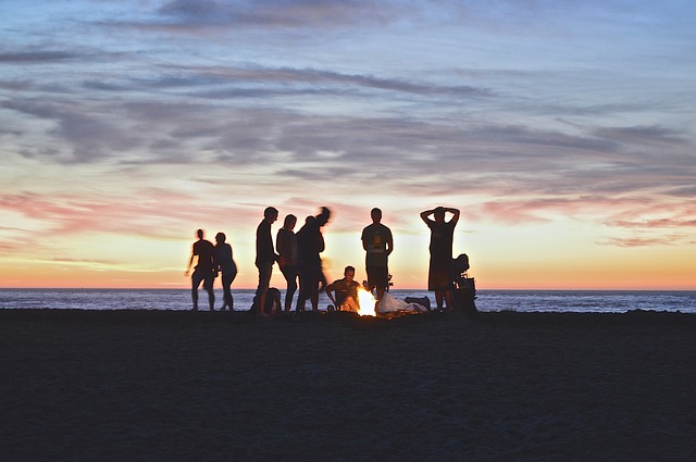 gathering around a campfire